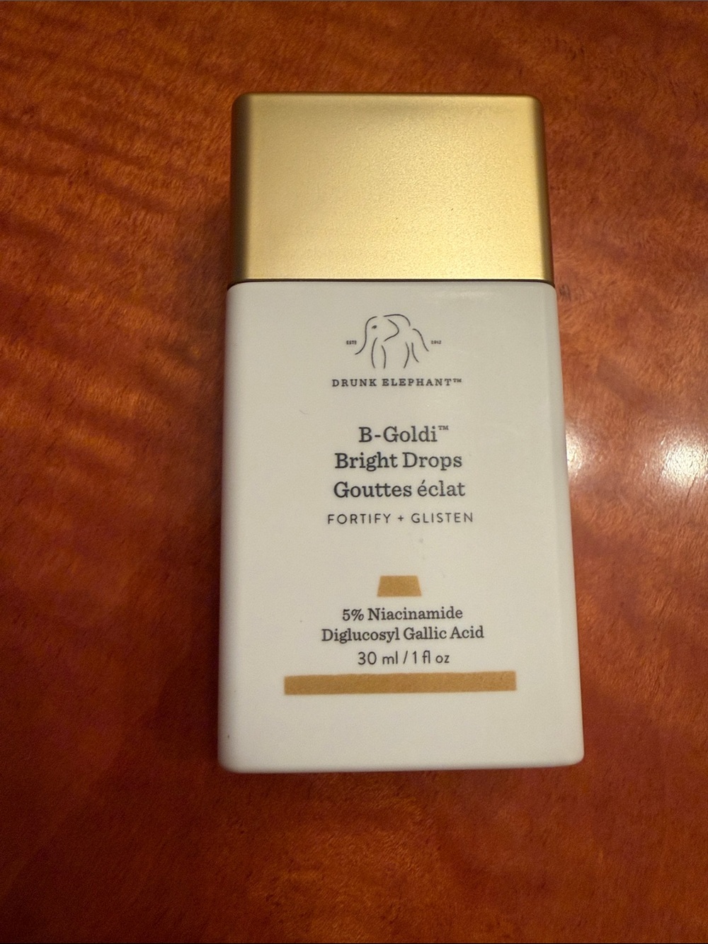 New Drunk Elephant White and Gold B-Goldi Bright Drops Serum Bottle